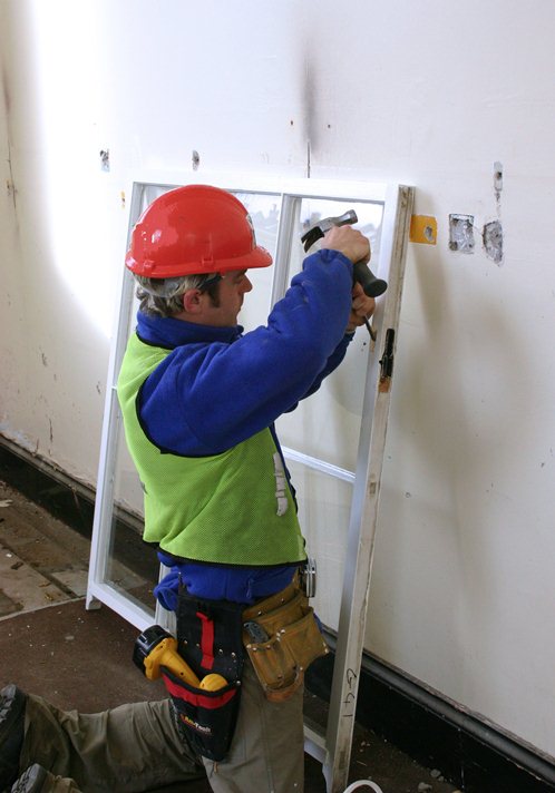 Wessex Restoration team repairing sash windows