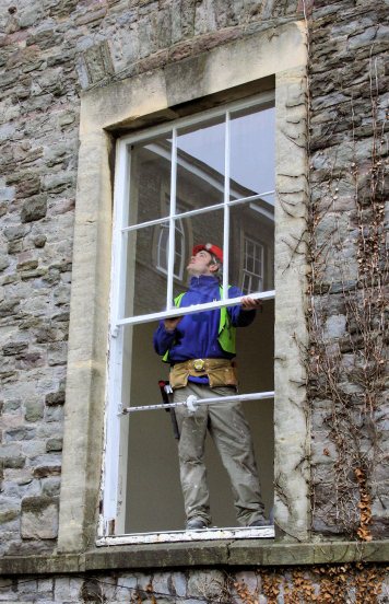 Wessex Restoration team repairing sash windows